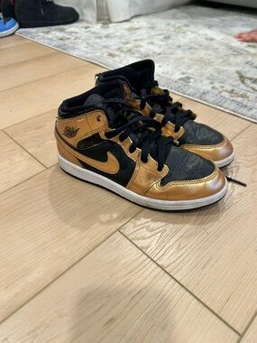Nike Jordan 1 Mid - Black and Metallic Gold High-Top Sneakers